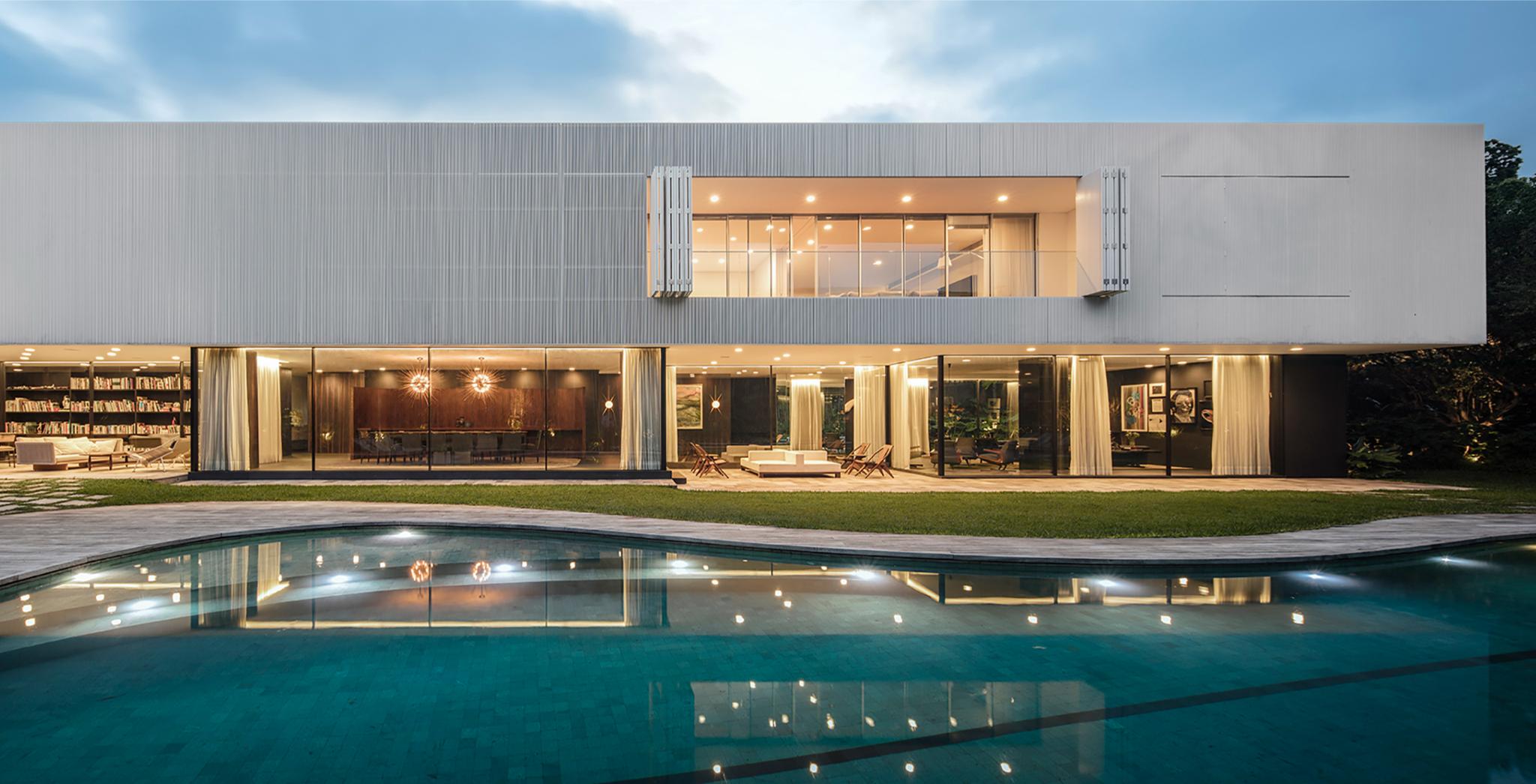 Luxury villa with infinity pool overlooking the Mediterranean sea at sunset